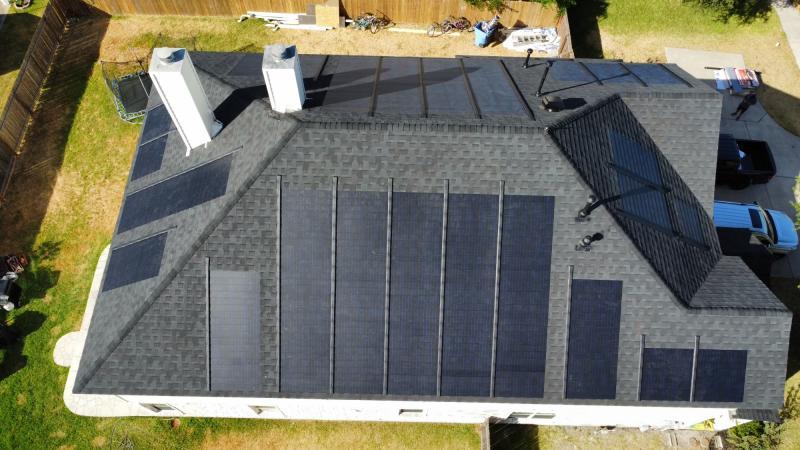 FOR A BRIGHTER TOMORROW: Divided Sky Roofing and Solar puts the sun to work