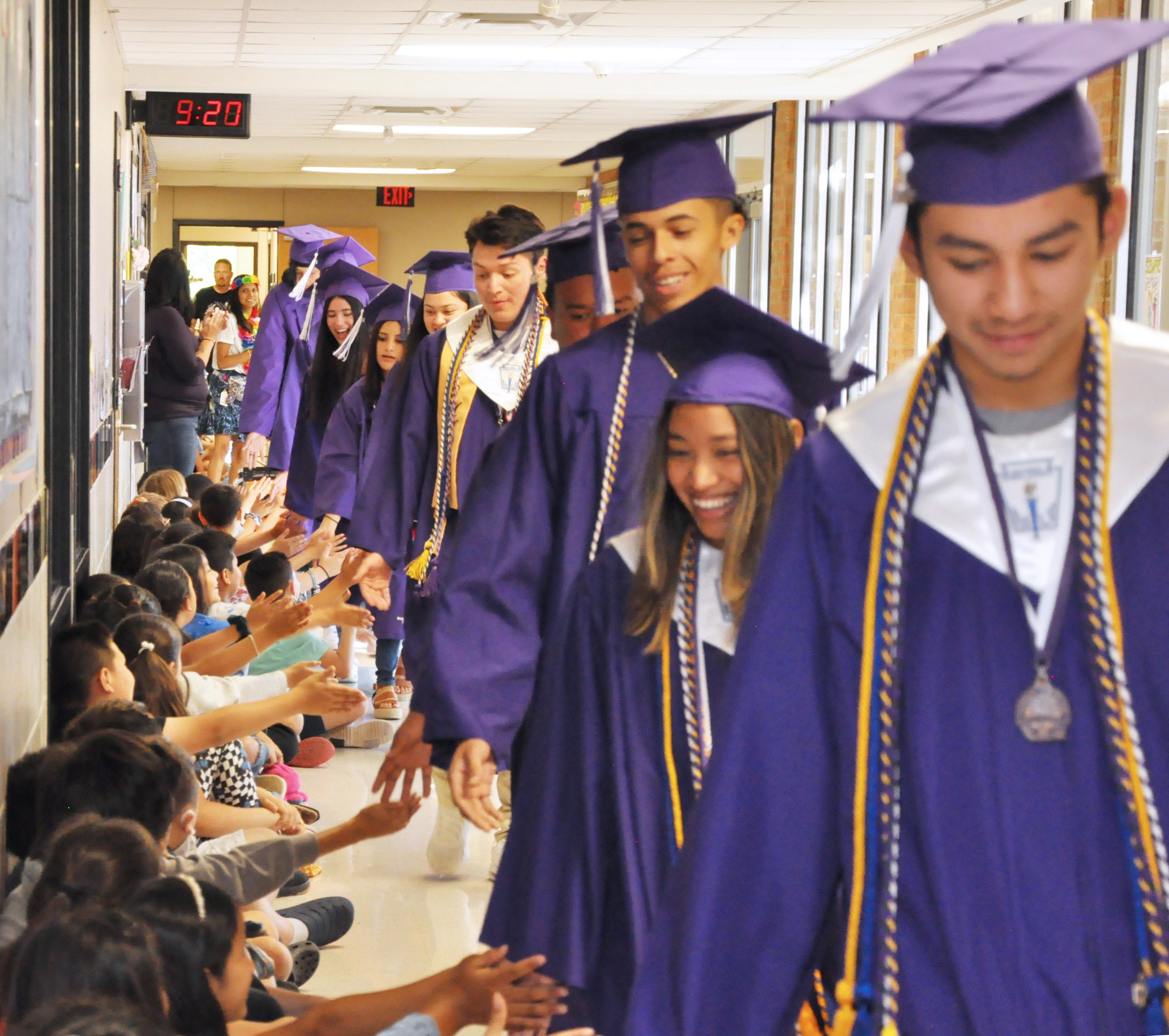 A STEP CLOSER TO GRADUATION San Marcos High School seniors participate