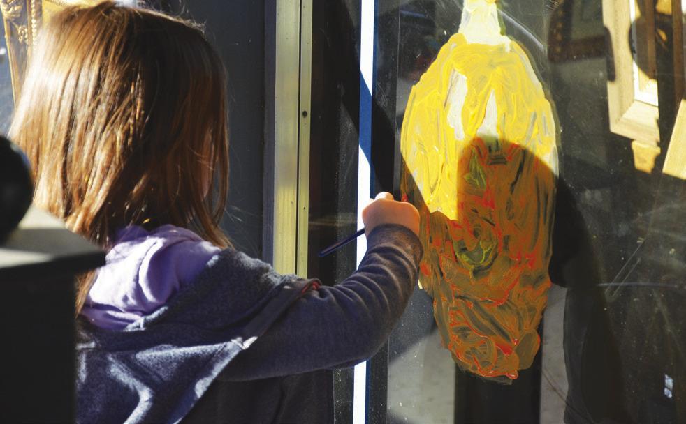 Downtown Square painted with Halloween, fall-themed art during SMAL event