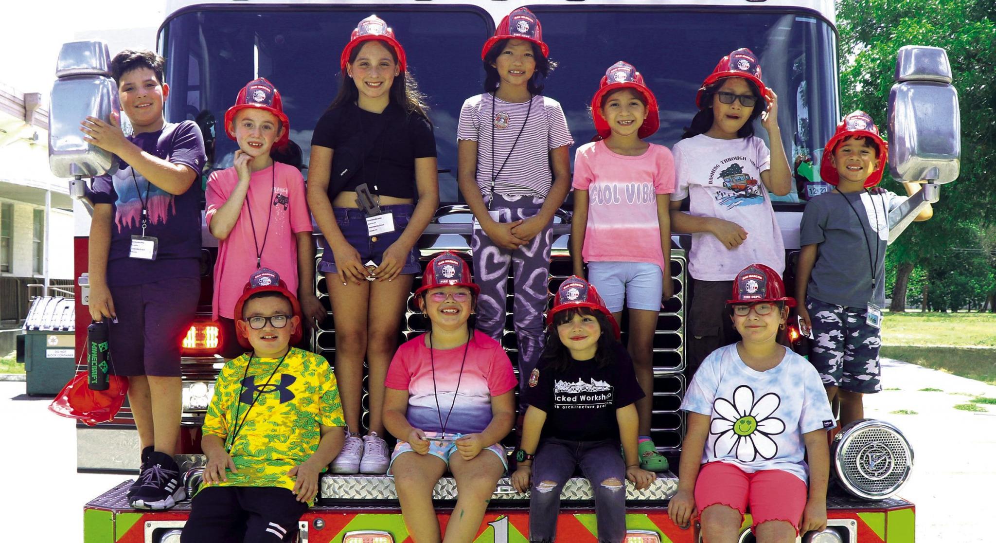 Firefighters visit children at Centro Cultural Hispano de San Marcos