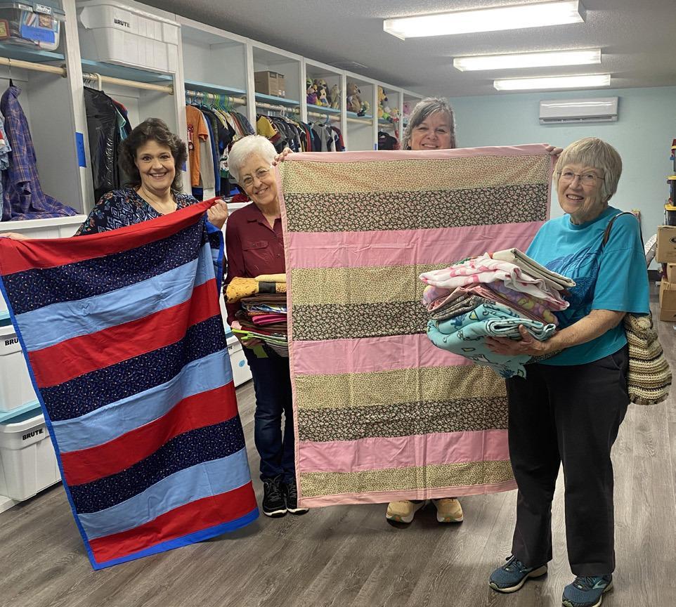 Sewing guild donates handmade quilts to new area nonprofit