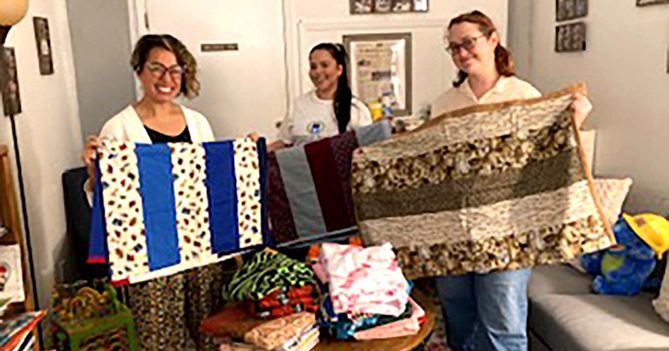 SMUUF Sewing Guild donates children's quilts