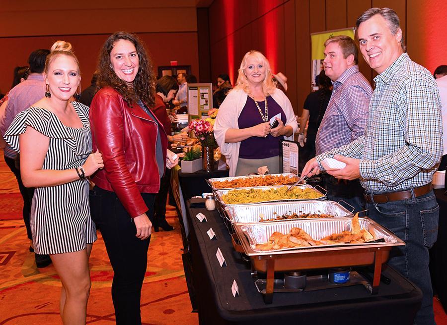 2019 Taste – Benefiting the United Way | San Marcos, TX | Jessica Pizana and Deanna Lalich sample some of the cuisine during TASTE 2019 benefiting United Way Hays and Caldwell counties. | Photo by Lance Winter
