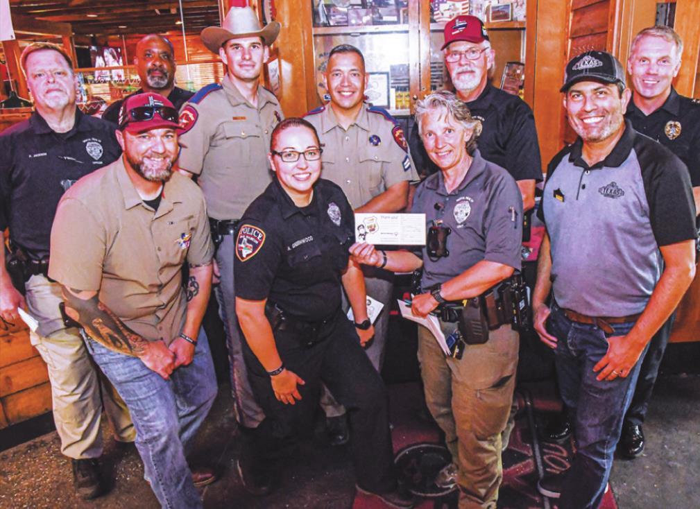 Tip-a-Cop fundraiser brings in $2K for Special Olympics Texas